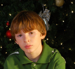 stock-photo-4738234-sad-boy-at-christmas